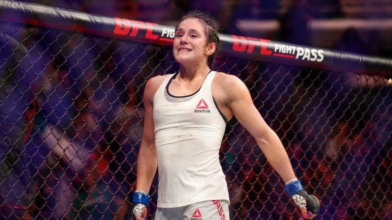 Alexa Grasso reacts after defeating Karolina Kowalkiewicz during their women's strawweight mixed martial arts bout at UFC 238, Saturday, June 8, 2019, in Chicago. (Kamil Krzaczynski/AP Photo)