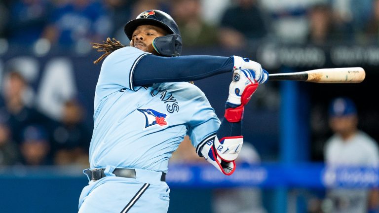 Toronto Blue Jays' Vladimir Guerrero Jr. (27) strikes out against the Texas Rangers during seventh inning American League MLB baseball action in Toronto, on Thursday, Sept. 14, 2023. (Spencer Colby/CP)