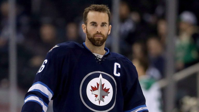 Winnipeg Jets' Andrew Ladd (16) warms up as the Jets prepare to play the Dallas Stars during NHL hockey action in Winnipeg, Tuesday, February 23, 2016. (Trevor Hagan/CP)