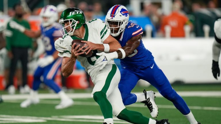 New York Jets quarterback Aaron Rodgers (8) is sacked by Buffalo Bills defensive end Leonard Floyd (56) during the first quarter of an NFL football game, Monday, Sept. 11, 2023, in East Rutherford, N.J. (Seth Wenig/AP)