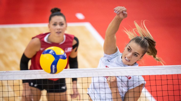 Canada's Kiera Van Ryk spikes the ball in her team's bronze medal victory over Cuba in the the 2023 NORCECA Senior Women’s Volleyball Continental Championship, in Quebec City in a Sunday, Sept. 3, 2023, handout photo. (The Canadian Press/HO-Norceca, Mathieu Belanger)