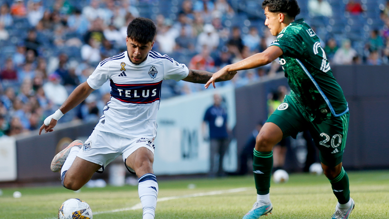 Gauld's late PK goal helps Whitecaps tie Sporting KC 1-1