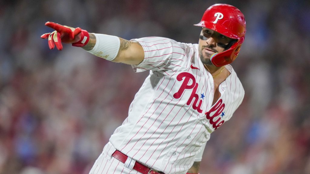 Philadelphia Phillies - Photo of Nick Castellanos wearing the powder blue  Phillies jersey in the dugout.