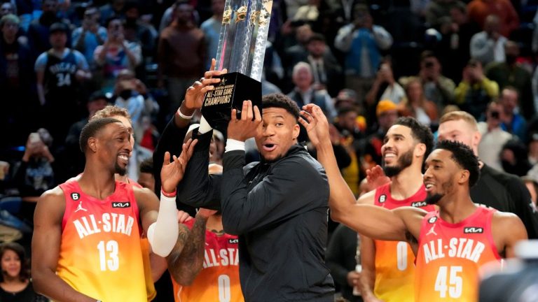 Giannis Antetokounmpo holds up the winning team trophy after the NBA basketball All-Star game Sunday, Feb. 19, 2023, in Salt Lake City. (Rick Bowmer/AP Photo)