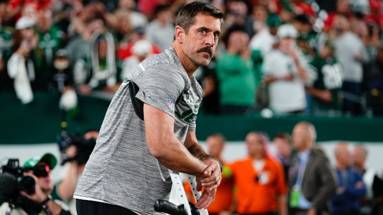 New York Jets quarterback Aaron Rodgers stands on the field before an NFL football game against the Kansas City Chiefs, Sunday, Oct. 1, 2023, in East Rutherford, N.J. (Frank Franklin II/AP)