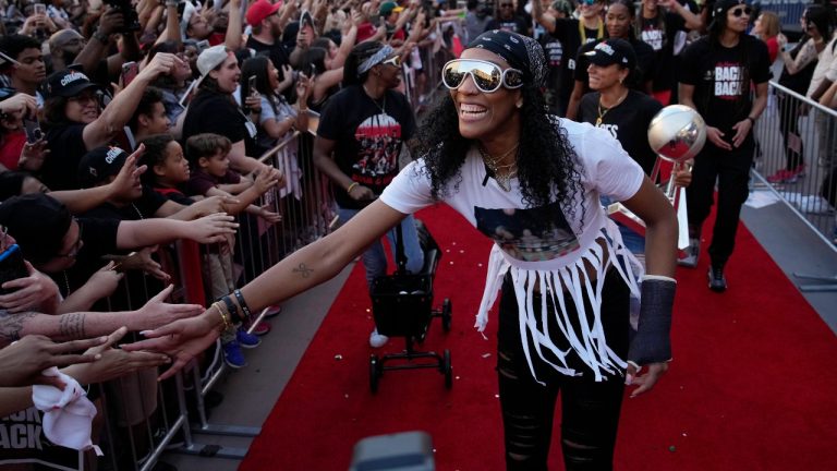 Las Vegas Aces forward A'ja Wilson celebrates during a rally to celebrate the team's WNBA championship. (John Locher/AP)