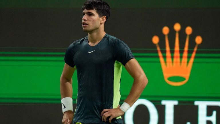 Carlos Alcaraz of Spain reacts during the 4th round of the men's singles match against Grigor Dimitrov of Bulgaria in the Shanghai Masters tennis tournament at Qizhong Forest Sports City Tennis Center in Shanghai, China, Wednesday, Oct. 11, 2023. (Andy Wong/AP)