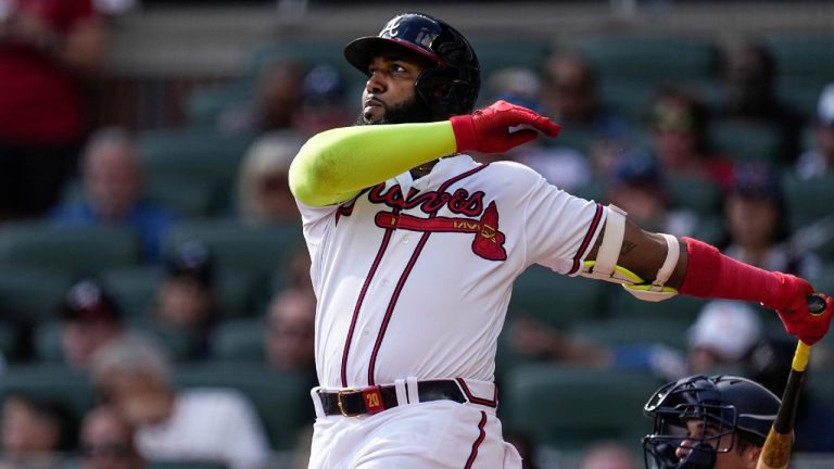 Atlanta Braves designated hitter Marcell Ozuna hits a three-run home run in the third inning of a baseball game against the Washington Nationals, Sunday, Oct. 1, 2023, in Atlanta. (John Bazemore/AP)