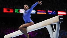 Simone Biles becomes most decorated gymnast of all time with win at Worlds