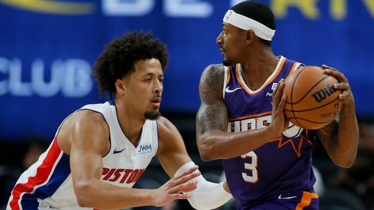 Detroit Pistons guard Cade Cunningham guards Phoenix Suns guard Bradley Beal (3) during the first half of a preseason NBA basketball game Sunday, Oct. 8, 2023, in Detroit. (Duane Burleson/AP)