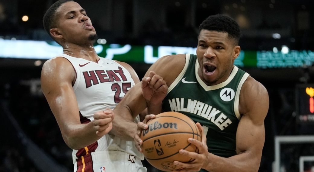 Antetokounmpo, Lillard help Bucks hold off Heat in playoff rematch