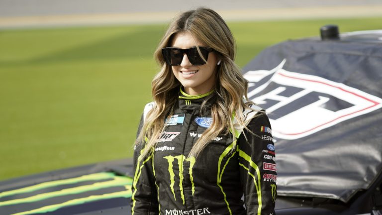 Hailie Deegan stands on pit road before qualifying for the Truck Series auto race at Daytona International Speedway, Friday, Feb. 18, 2022, in Daytona Beach, Fla. (John Raoux/AP)