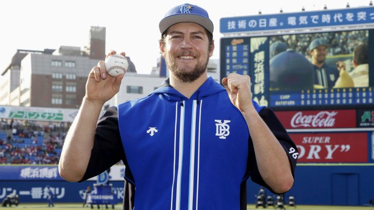 Yokohama DeNA BayStars pitcher Trevor Bauer poses for a photo, after his team's win against Hiroshima Carp during a baseball game in Yokohama, near Tokyo, Wednesday, May 3, 2023. (Kyodo News via AP) 