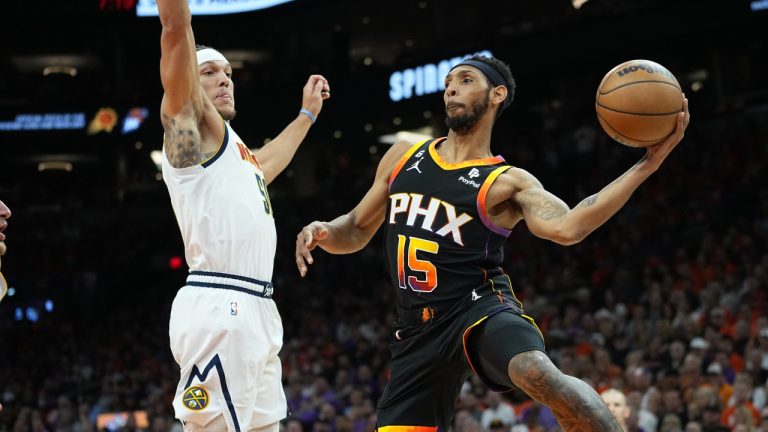 Former Phoenix Suns guard Cameron Payne (15) passes as Denver Nuggets forward Aaron Gordon defends during the first half of Game 6 of an NBA basketball Western Conference semifinal game, Thursday, May 11, 2023, in Phoenix. (Matt York/AP)