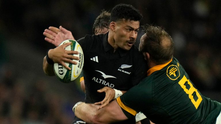 New Zealand's Scott Barrett, left, is tackled by South Africa's Duane Vermeulen during the rugby union international match between South Africa and New Zealand, at Twickenham stadium in London, Friday, Aug. 25, 2023. (Alastair Grant/AP) 