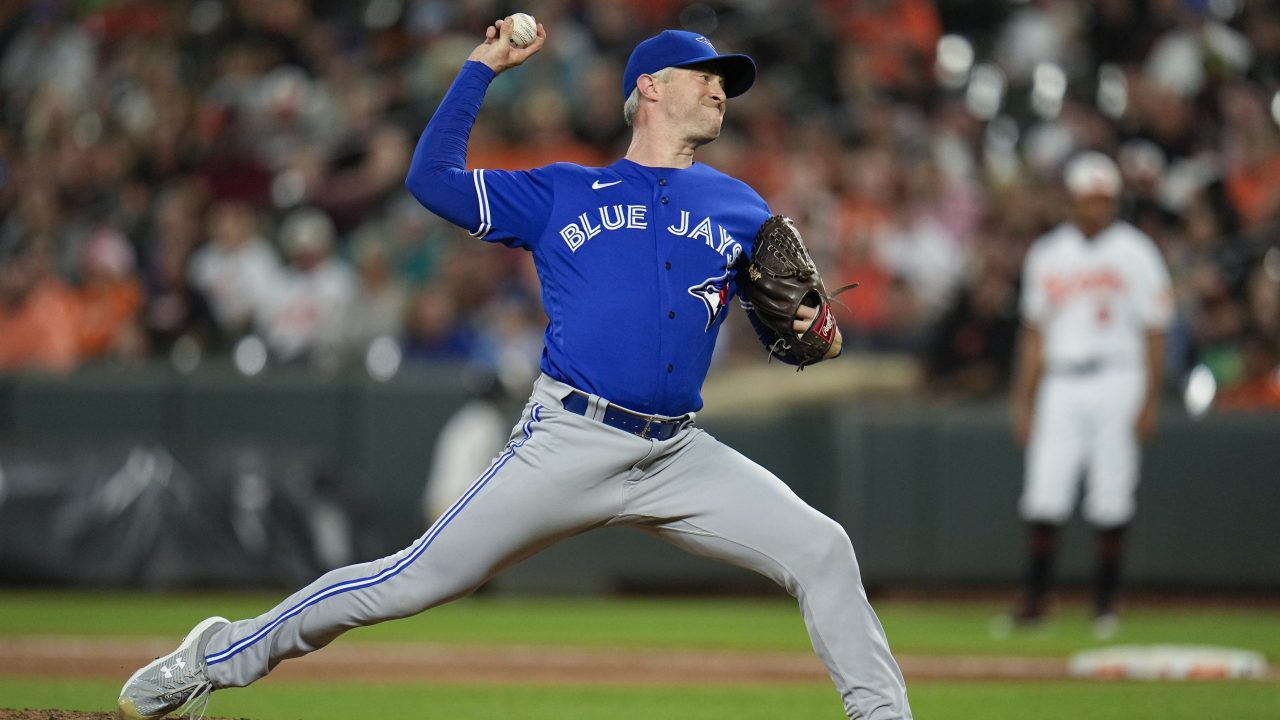 Jays hold on to beat Reds as Hicks throws team's fastest pitch