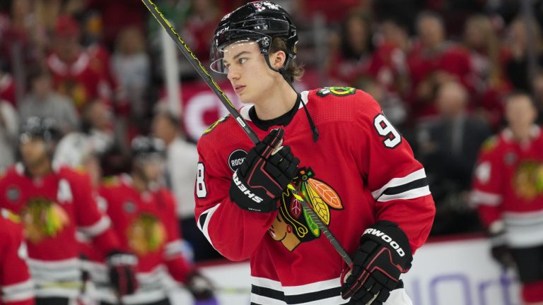 Chicago Blackhawks centre Connor Bedard warms up for the team's preseason NHL hockey game against the St. Louis Blues on Thursday, Sept. 28, 2023, in Chicago. (Erin Hooley/AP)