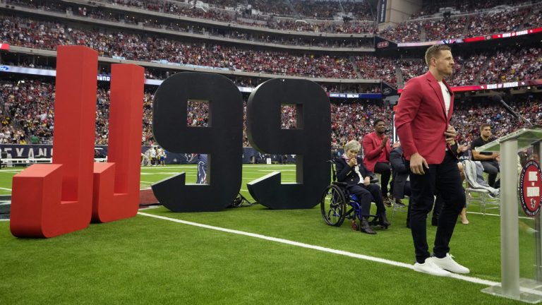 Former Houston Texans player J.J. Watt is honored during a ceremony to retire his jersey number during an NFL football game between the Houston Texans and the Pittsburgh Steelers, Sunday, Oct. 1, 2023, in Houston. (AP Photo/David J. Phillip)