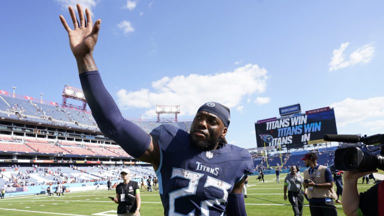 Tennessee Titans running back Derrick Henry (22) waves an NFL football game between the Tennessee Titans and the Cincinnati Bengals, Sunday, Oct. 1, 2023, in Nashville, Tenn. (George Walker IV/AP)