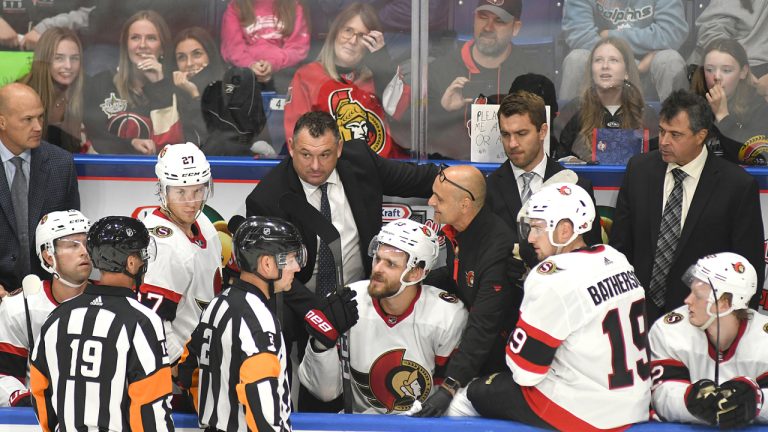 Ottawa Senators Coach D.J. Smith discusses a play during a timeout during third period NHL preseason hockey action against the Florida Panthers, in Sydney, N.S., Sunday, Oct. 1, 2023. (Vaughan Merchant/CP)