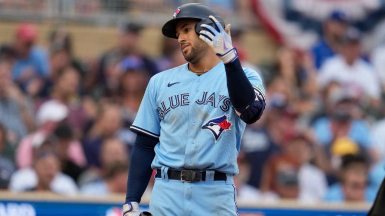 Toronto Blue Jays' George Springer reacts after fouling out during the third inning in Game 1 of an AL wild-card baseball playoff series against the Minnesota Twins Tuesday, Oct. 3, 2023, in Minneapolis. (AP)