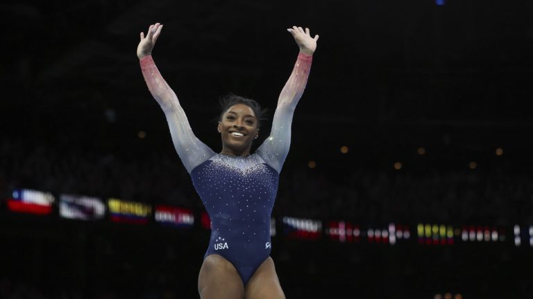 United States' Simone Biles celebrates winning the gold medal with her team during the women's team final at the Artistic Gymnastics World Championships in Antwerp, Belgium, Wednesday, Oct. 4, 2023. (Geert vanden Wijngaert/AP)