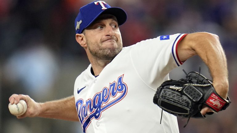 Texas Rangers starting pitcher Max Scherzer throws against the Houston Astros during the first inning in Game 3 of the baseball American League Championship Series Wednesday, Oct. 18, 2023, in Arlington, Texas. (Julio Cortez/AP)