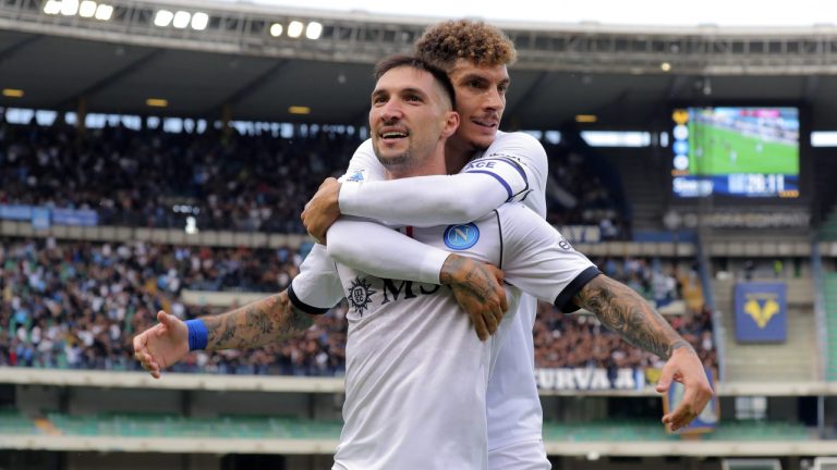 Napoli's Matteo Politano celebrates with teammate Giovanni Di Lorenzo, right, after scoring his side's first goal during the Italian Serie A soccer match between Verona and Napoli at the Marcantonio Bentegodi Stadium in Verona, Italy, Saturday, Oct. 21, 2023. (Paola Garbuio/LaPresse via AP)