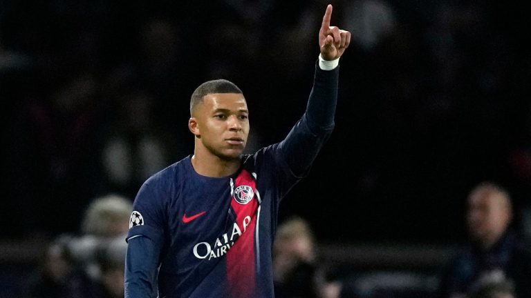 French league leader Paris Saint-Germain drew 2-2 at home to Reims on Sunday as Kylian Mbappé was left on the bench for the second straight league game. (Thibault Camus/AP) 