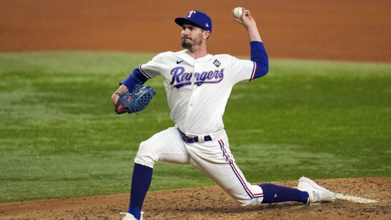 Texas Rangers starting pitcher Andrew Heaney throws against the Arizona Diamondbacks during the seventh inning in Game 2 of the baseball World Series Saturday, Oct. 28, 2023, in Arlington, Texas. (Julio Cortez/AP)