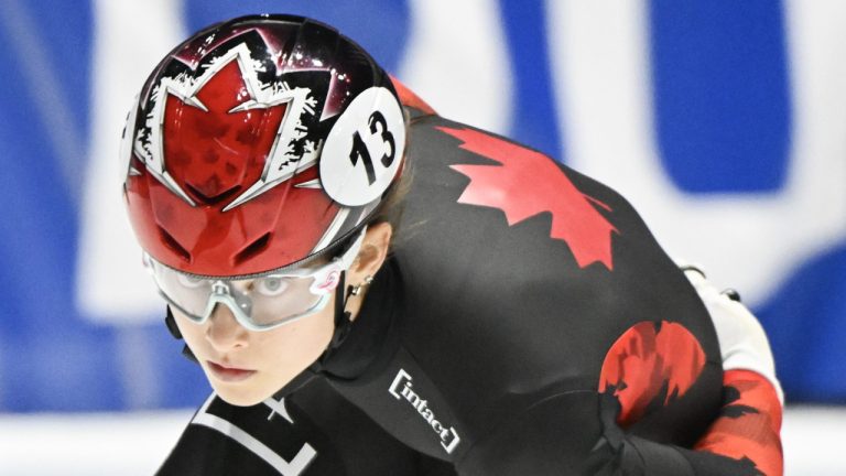 Danae Blais (13) of Canada skates during the 1000-metre quarter-final race at the World Cup Short Track Speedskating event in Montreal, Sunday, Oct. 29, 2023. (Graham Hughes/CP)