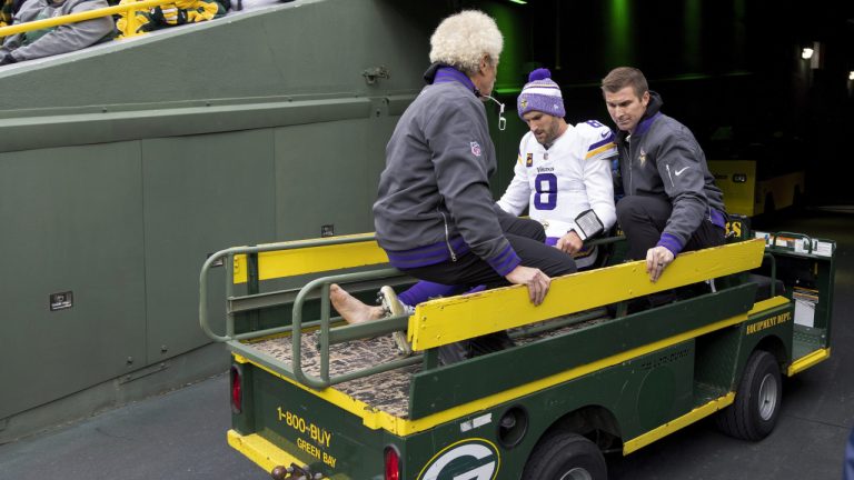 Minnesota Vikings quarterback Kirk Cousins (8) is carted off the field after sustaining an injury during the second half of an NFL football game against the Green Bay Packers, Sunday, Oct. 29, 2023, in Green Bay, Wis. (Carlos Gonzalez/Star Tribune via AP)