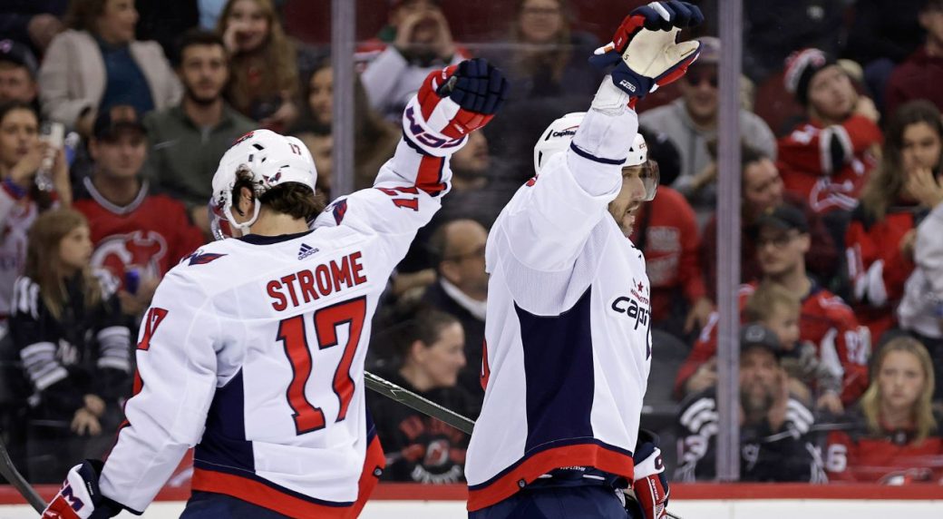 Capitals rally with three goals in third to stave off Devils