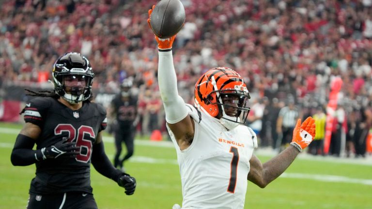 Cincinnati Bengals wide receiver Ja'Marr Chase scores a touchdown during the second half of an NFL football game against the Arizona Cardinals, Sunday, Oct. 8, 2023, in Glendale, Ariz. (Rick Scuteri/AP Photo)