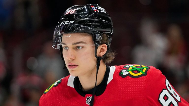 Chicago Blackhawks centre Connor Bedard warms up for the team's preseason NHL hockey game against the St. Louis Blues on Thursday, Sept. 28, 2023, in Chicago. (Erin Hooley/AP)