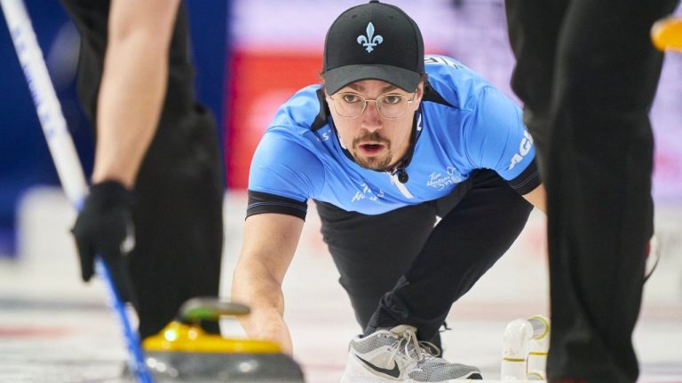 Quebec skip Félix Asselin watches his shot during his match against P.E.I. at the 2023 Tim Hortons Brier at Budweiser Gardens in London, Ont., Sunday, March 5, 2023.  (Geoff Robins/CP Photo)
