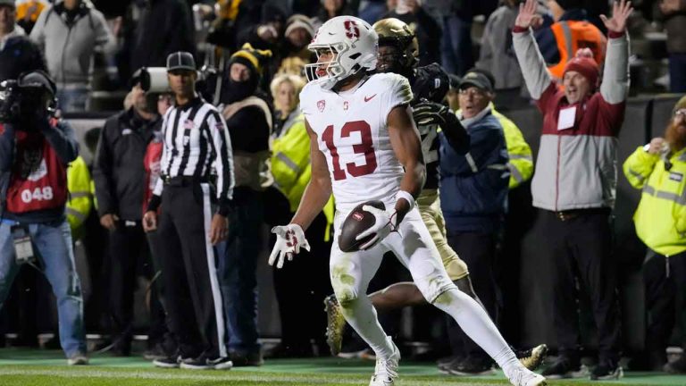 Stanford wide receiver Elic Ayomanor reacts after catching a pass for a touchdown over Colorado cornerback Travis Hunter in overtime of an NCAA college football game. (David Zalubowski/AP)