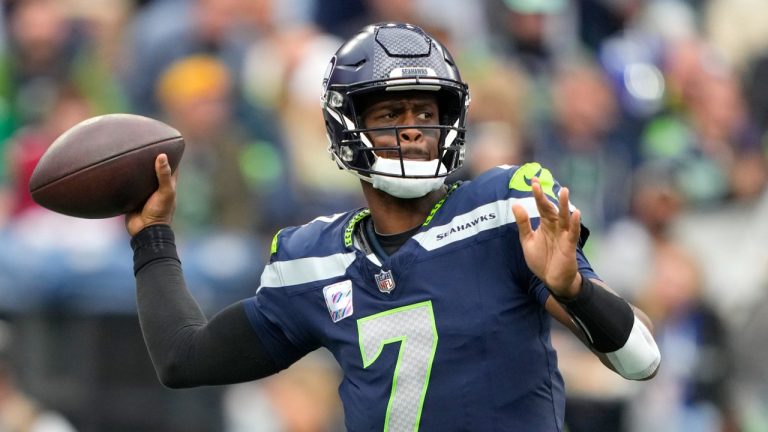 Seattle Seahawks quarterback Geno Smith throws a pass against the Arizona Cardinals during the second half of an NFL football game. (Lindsey Wasson/AP)