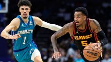 Rookie Brandon Miller provides spark as Hornets top Hawks in opener