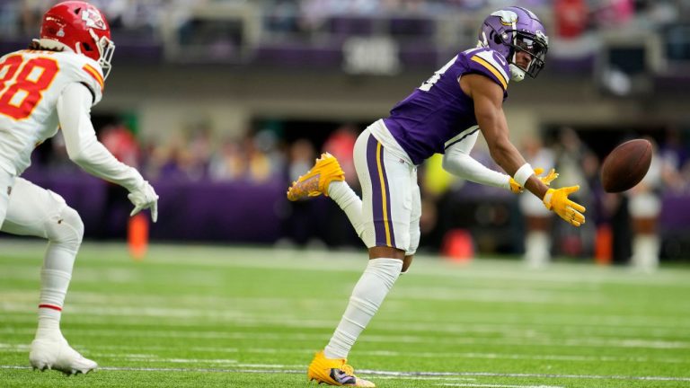 Minnesota Vikings wide receiver Justin Jefferson looks to catch a pass in front of Kansas City Chiefs cornerback L'Jarius Sneed during the first half of an NFL football game, Sunday, Oct. 8, 2023, in Minneapolis. (Abbie Parr/AP Photo)