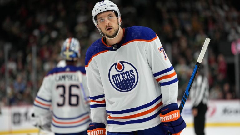 Edmonton Oilers defenseman Vincent Desharnais stands on the ice during the second period of the team's NHL hockey game against the Minnesota Wild, Tuesday, Oct. 24, 2023, in St. Paul, Minn. (Abbie Parr/AP)