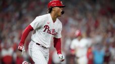 Wheeler strikes out eight, leads Phillies over Marlins in Game 1