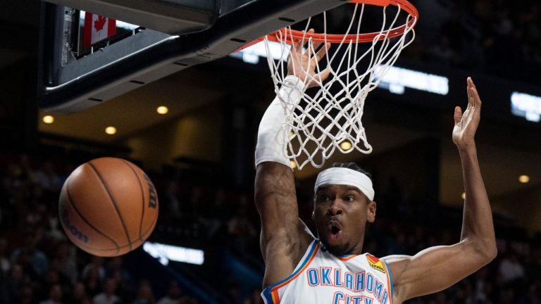 Oklahoma City Thunder's Shai Gilgeous-Alexander scores against the Detroit Pistons during first half NBA preseason basketball action in Montreal on Thursday, Oct. 12, 2023. (Christinne Muschi/CP Photo)