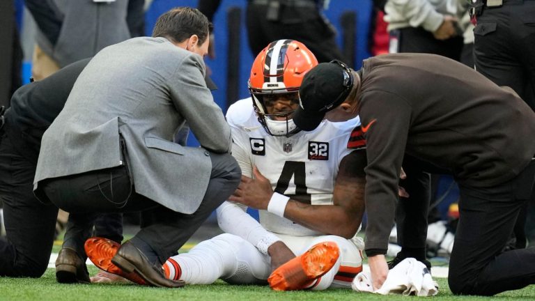 Cleveland Browns quarterback Deshaun Watson sits on the field after getting injured during the first half of an NFL football game against the Indianapolis Colts, Sunday, Oct. 22, 2023, in Indianapolis. (Michael Conroy/AP Photo)