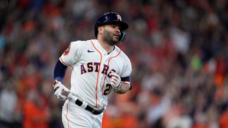 Houston Astros' Jose Altuve rounds the bases after a solo home run during the first inning in Game 1 of an American League Division Series baseball game against the Minnesota Twins, Saturday, Oct. 7, 2023, in Houston. (Kevin M. Cox/AP Photo)