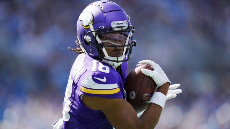 Minnesota Vikings wide receiver Justin Jefferson catches a touchdown pass against the Carolina Panthers during the second half of an NFL football game Sunday, Oct. 1, 2023, in Charlotte, N.C. (Rusty Jones/AP)