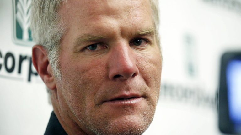 FILE - Former NFL quarterback Brett Favre speaks with reporters prior to his induction to the Mississippi Hall of Fame, Aug. 1, 2015, in Jackson, Miss. (Rogelio V. Solis/AP)