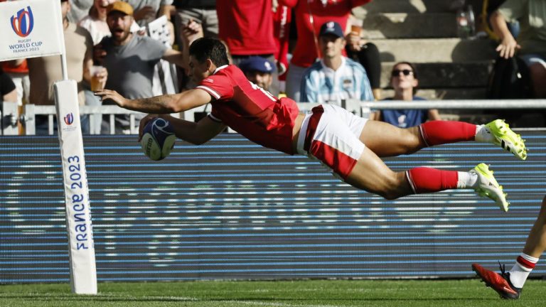 Wales' Louis Rees-Zammit scores a try during the Rugby World Cup Pool C match between Wales and Georgia at the Stade de la Beaujoire in Nantes, western France, Saturday, Oct. 7, 2023. (Jeremias Gonzalez/AP)