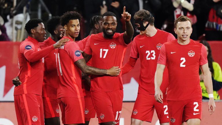 Canada forward Cyle Larin (17) celebrates his goal against Honduras with teammates during first half CONCACAF Nations League soccer action in Toronto on Tuesday, March 28, 2023. (CP/Nathan Denette)