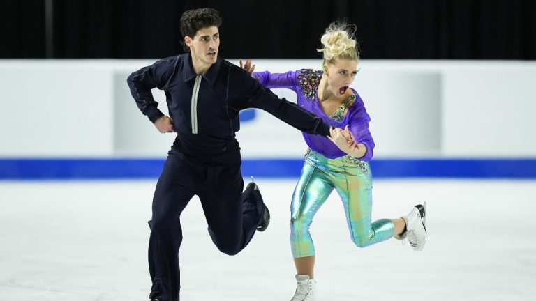 Piper Gilles and Paul Poirier, of Canada, perform their ice dance rhythm dance program during the Skate Canada International figure skating competition, in Vancouver, B.C., Friday, Oct. 27, 2023. (Darryl Dyck/CP)